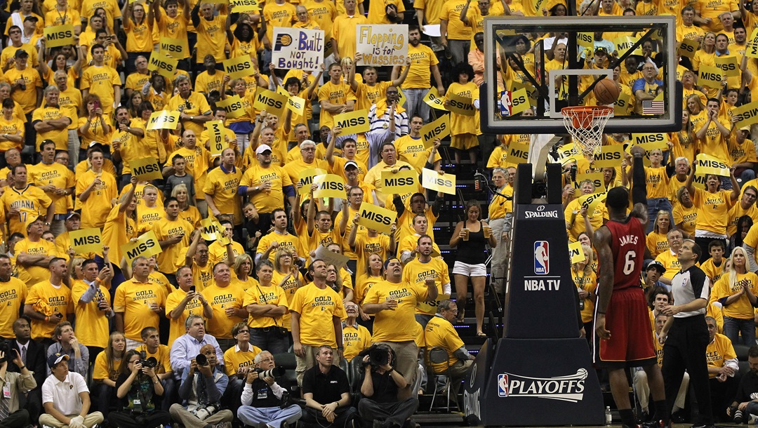 Fans try to distrack LeBron James #6 of the Miami Heat as he shoots a free throw against the Indiana Pacers in Game Three of the Eastern Conference Semifinals in the 2012 NBA Playoffs at Bankers Life Fieldhouse on May 17, 2012 in Indianapolis, Indiana. The Pacers defeated the Heat 94-75.