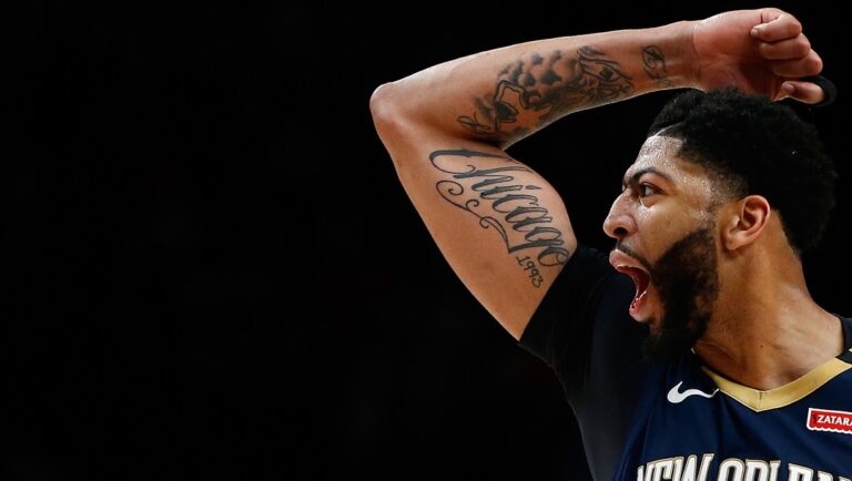 Anthony Davis #23 of the New Orleans Pelicans cheers against the Portland Trail Blazers during Game Two of the Western Conference Quarterfinals during the 2018 NBA Playoffs at the Moda Center on April 17, 2018 in Portland, Oregon.