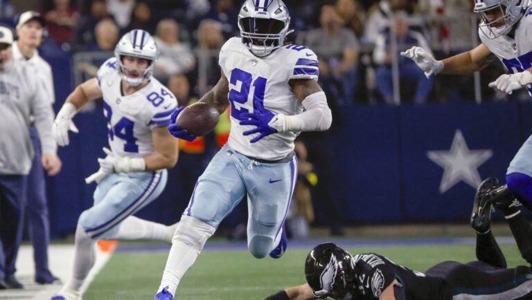 Dallas Cowboys' Ezekiel Elliott runs during the second half of an NFL football game against the Philadelphia Eagles Saturday, Dec. 24, 2022, in Arlington, Texas. The Dallas Cowboys are reuniting with running back Ezekiel Elliott after agreeing to terms on a contract with the former two-time rushing champion, a person with knowledge of the deal said Monday, April 29, 2024.