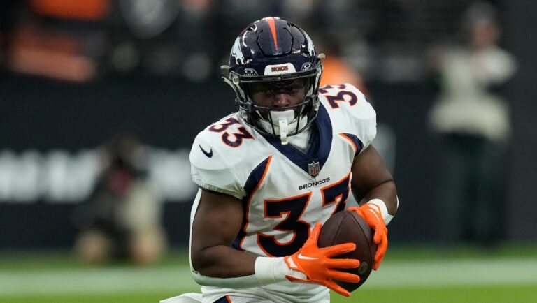 Denver Broncos running back Javonte Williams (33) plays against the Las Vegas Raiders during an NFL football game, Sunday, Jan. 7, 2024, in Las Vegas. (AP Photo/John Locher)