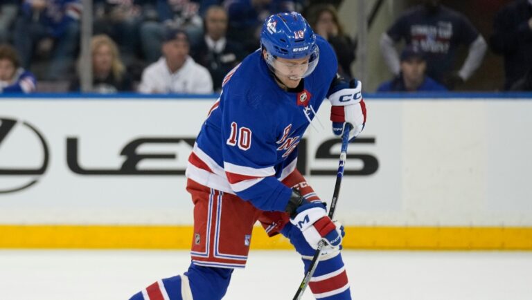 New York Rangers' Artemi Panarin shoots during the first period in Game 1 of an NHL hockey Stanley Cup first-round playoff series against the Washington Capitals, Sunday, April 21, 2024, in New York. (AP Photo/Seth Wenig)