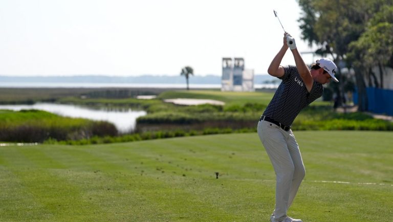 J.T. Poston hits his tee shot on the 18th hole during the second round of the RBC Heritage golf tournament, Friday, April 19, 2024, in Hilton Head Island, S.C.