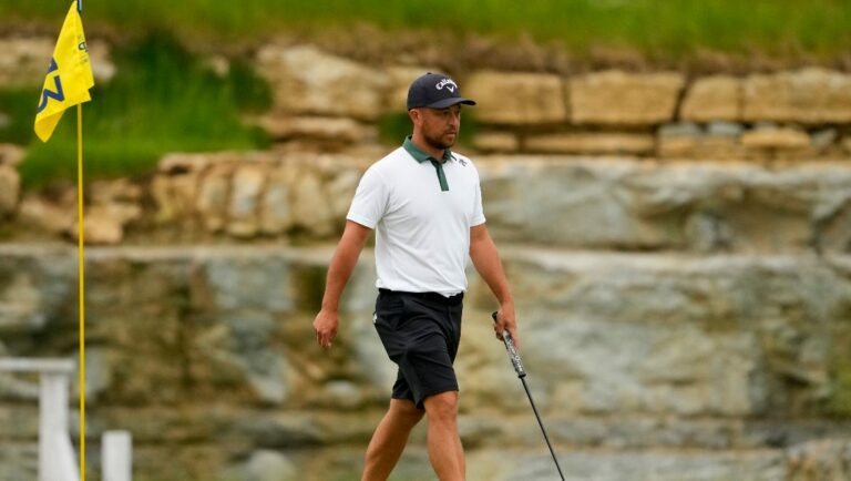 Xander Schauffele lines up a putt on the 13th hole during a practice round for the PGA Championship golf tournament at the Valhalla Golf Club, Tuesday, May 14, 2024, in Louisville, Ky.