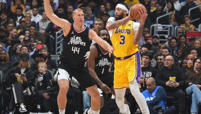 LOS ANGELES, CA - FEBRUARY 28: Anthony Davis #3 of the Los Angeles Lakers handles the ball during the game against the LA Clippers on February 28, 2024 at Crypto.Com Arena in Los Angeles, California.