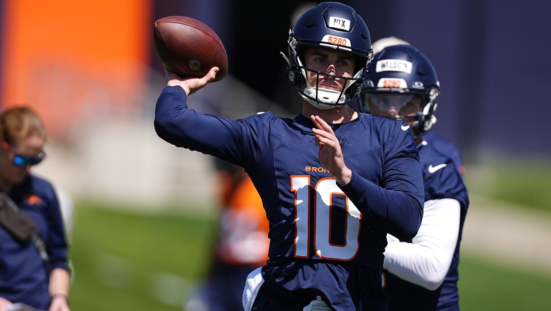 Denver Broncos rookie quarterback Bo Nix throws during practice at the NFL football team's training headquarters Thursday, May 23, 2024, in Centennial, Colo.