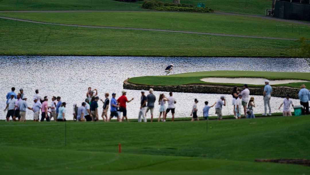 Collin Morikawa lines up a putt on the 17th green during the second round of the Wells Fargo Championship golf tournament at Quail Hollow on Friday, May 10, 2024, in Charlotte, N.C.