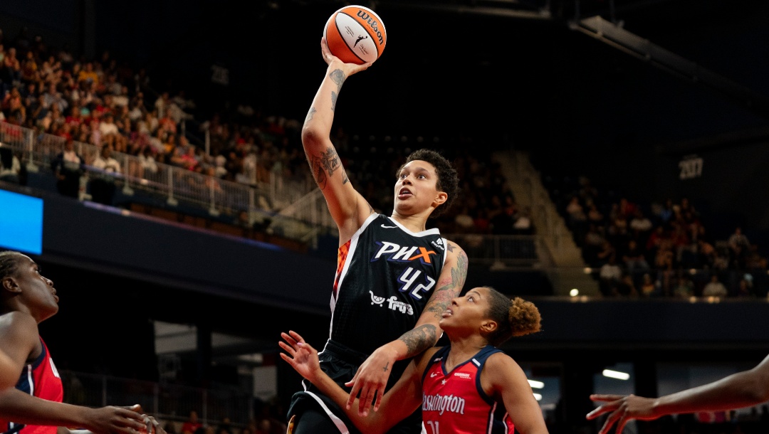 Phoenix Mercury center Brittney Griner (42) makes a layup during the second quarter of a WNBA basketball game against the Washington Mystics, July 23, 2023, in Washington.