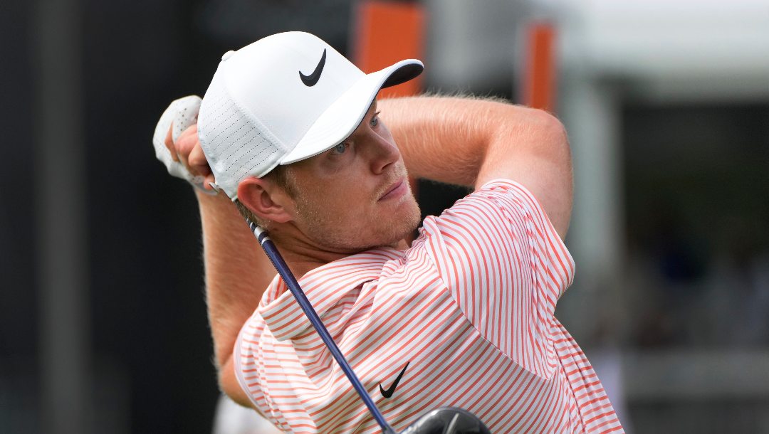 Cam Davis hits from the 16th tee during the final round of the Rocket Mortgage Classic golf tournament at Detroit Country Club, Sunday, June 30, 2024, in Detroit.