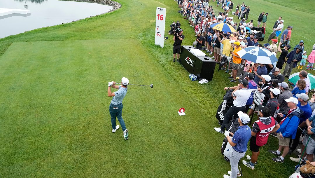 Collin Morikawa drives of the 16th tee during the final round of the Rocket Mortgage Classic golf tournament at Detroit Country Club, Sunday, July 2, 2023, in Detroit.