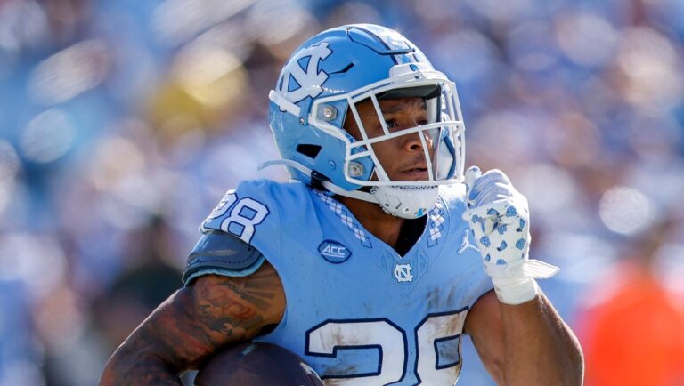 North Carolina running back Omarion Hampton runs for a touchdown in the first half of an NCAA college football game against Campbell in Chapel Hill, N.C., Saturday, Nov. 4, 2023. (AP Photo/Nell Redmond)