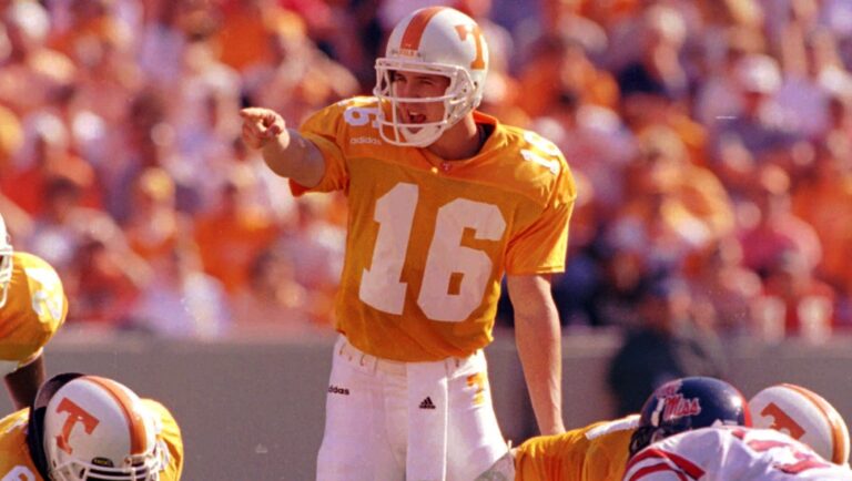 Tennessee quarterback Peyton Manning (16) directs a play during their 31-17 win over Ole Miss on Saturday, Oct. 4, 1997 in Knoxville, Tenn. Manning threw for 324 yards and two touchdowns.