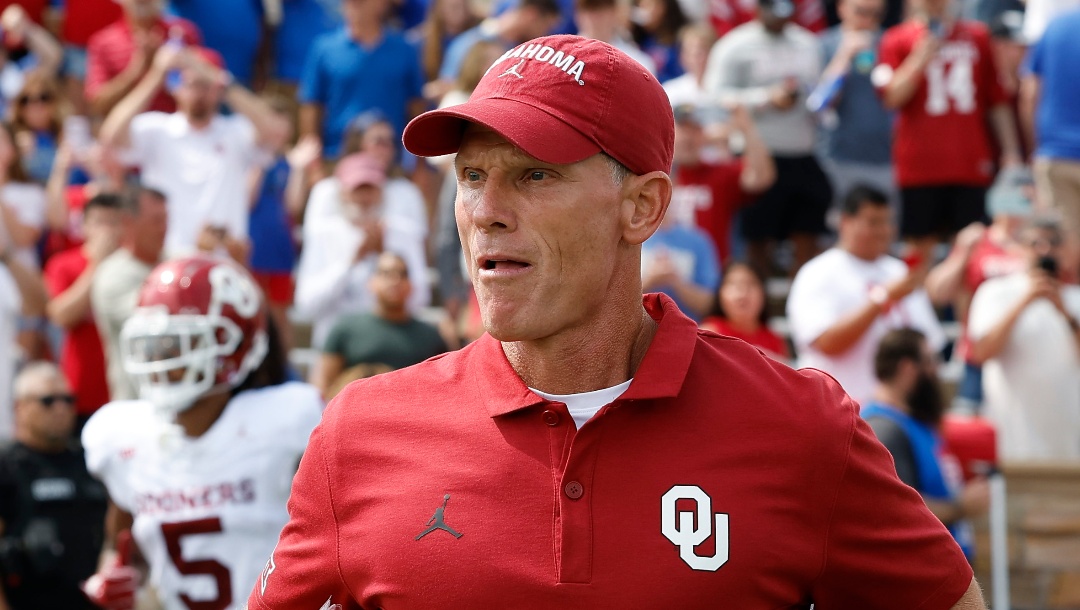 Oklahoma head coach Brent Venables runs onto the field before the start of an NCAA college football game against Tulsa, Saturday, Sept. 16, 2023, in Tulsa, Okla. (AP Photo/Alonzo Adams)