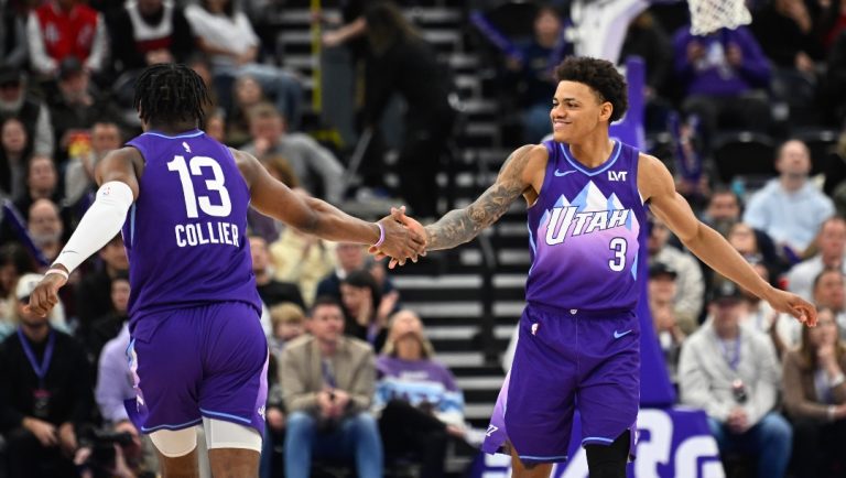 Isaiah Collier #13 and Keyonte George #3 of the Utah Jazz celebrate a play during the second half of a game against the Houston Rocketsat Delta Center on February 22, 2025 in Salt Lake City, Utah.