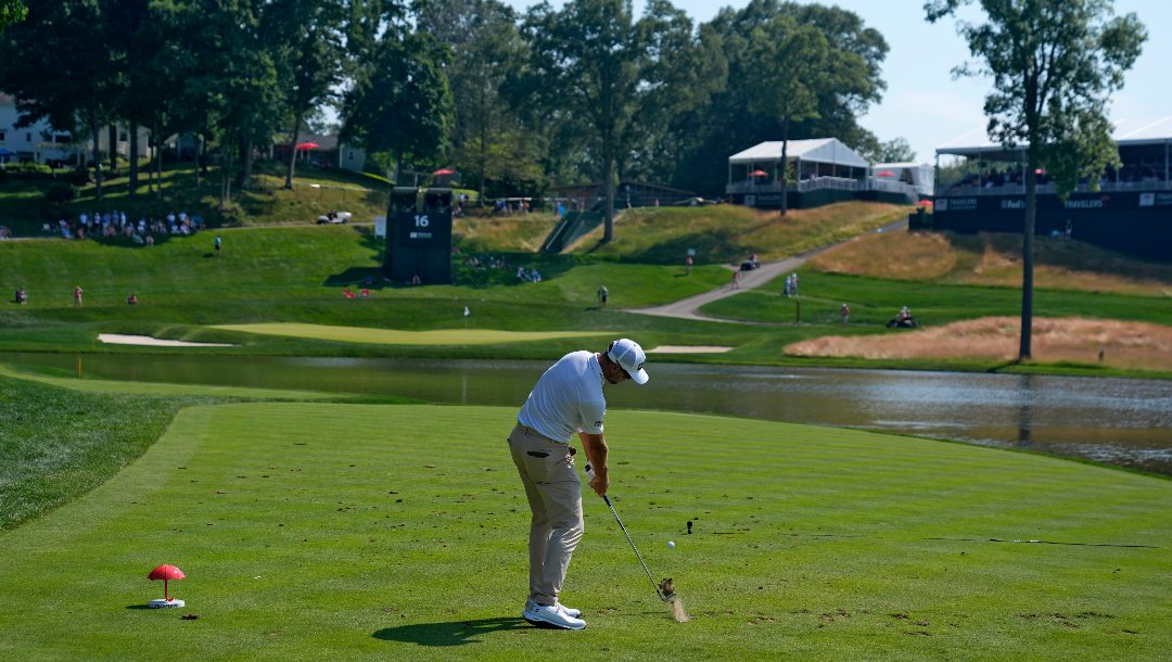 Corey Conners, of Canada, tees off on the 16th hole during the first round of the Travelers Championship golf tournament at TPC River Highlands, Thursday, June 20, 2024, in Cromwell, Conn.