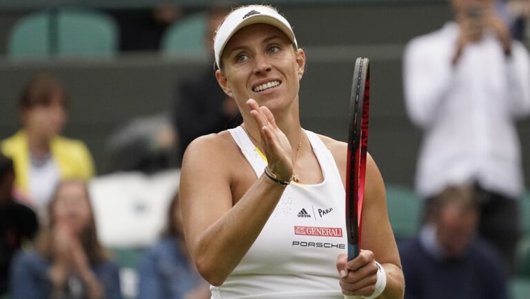 Germany's Angelique Kerber waves after defeating France's Kristina Mladenovic during their women's singles tennis match on day one of the Wimbledon tennis championships in London, Monday, June 27, 2022. Three-time Grand Slam champion Angelique Kerber withdrew from the U.S. Open on Wednesday, Aug. 24, 2022, because she is pregnant, announcing the news via social media by joking that “two against one just isn’t a fair competition” and posting a string of emojis that included a baby bottle.