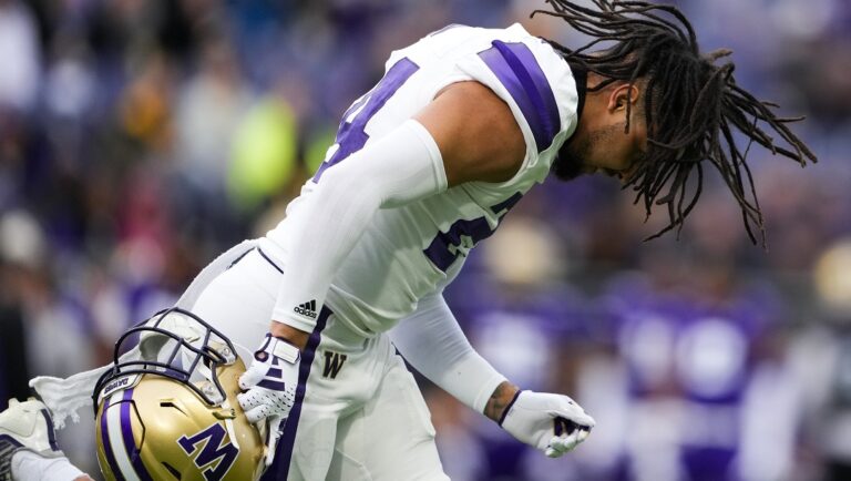 Washington safety Makell Esteen runs on the field during the NCAA college football team's spring game Friday, May 3, 2024, in Seattle.