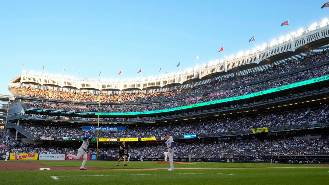 Los Angeles Dodgers' Teoscar Hernández runs the bases after hitting a home run against the New York Yankees during the second inning of a baseball game Saturday, June 8, 2024, in New York.