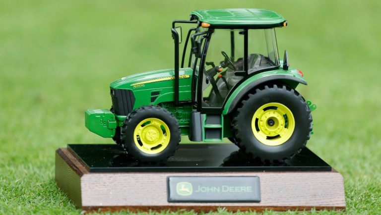 A John Deere tractor tee marker is seen during the third round of the John Deere Classic golf tournament at TPC Deere Run, Saturday, July 13, 2013, in Silvis, Ill.