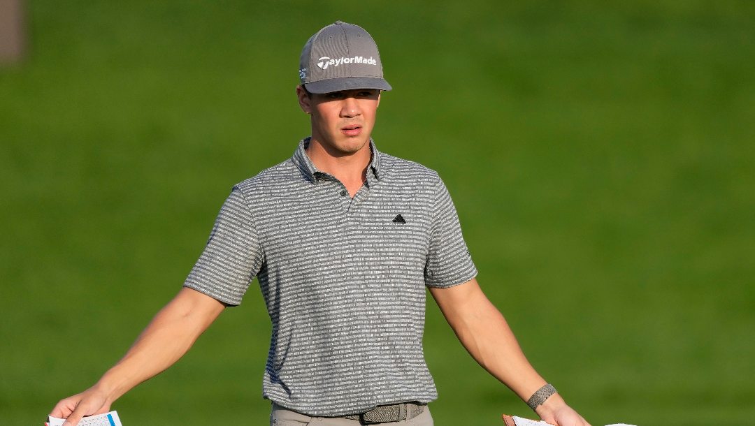 Michael Thorbjornsen of the U.S. prepares for his second shot on the 9th hole during the competition of the second round of the Dubai Desert Classic, in Dubai, United Arab Emirates, Saturday, Jan. 28, 2023.