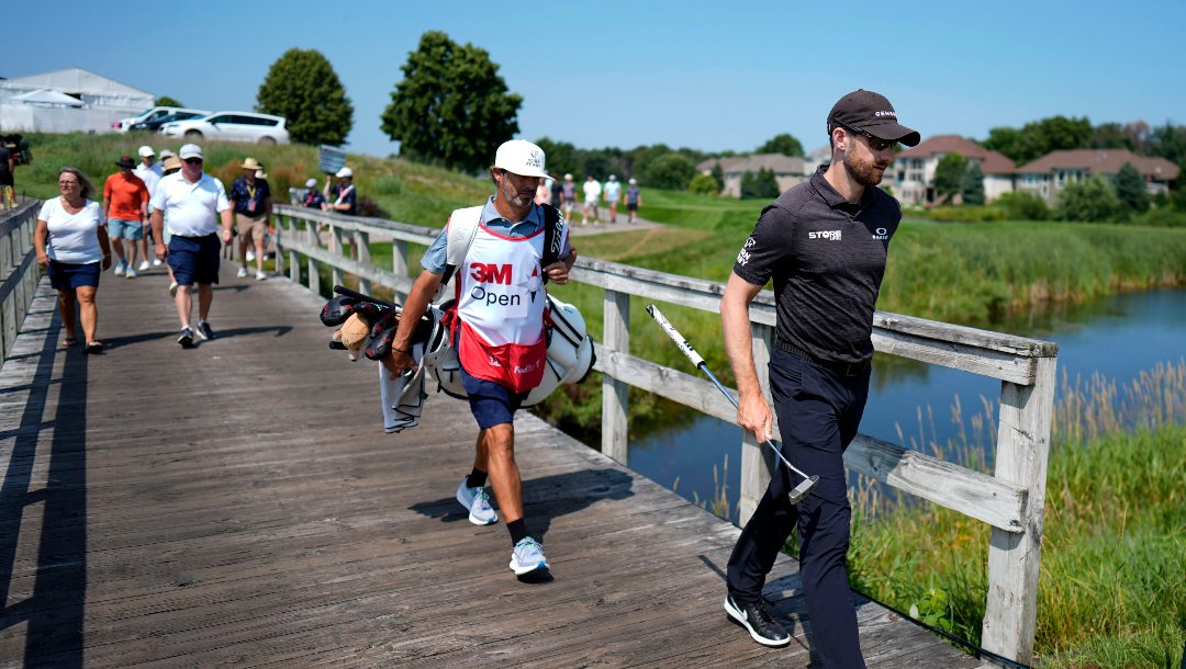 Patrick Rodgers walks to the green on the fourth hole during the first round of the 3M Open golf tournament at the Tournament Players Club, Thursday, July 25, 2024, in Blaine, Minn.