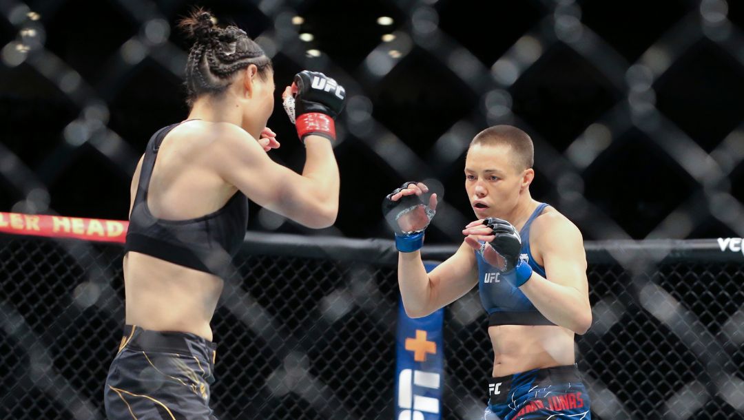 Rose Namajunas, right, and Zhang Weili move around the octagon during a UFC 261 mixed martial arts bout Saturday, April 24, 2021.