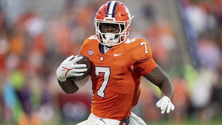 Clemson running back Phil Mafah (7) plays against North Carolina during an NCAA college football game Saturday, Nov. 18, 2023, in Clemson, S.C. The Tigers were defending Atlantic Coast Conference champions a summer ago and, with offensive coordinator Garrett Riley freshly in from CFP finalist TCU, poised for more success.