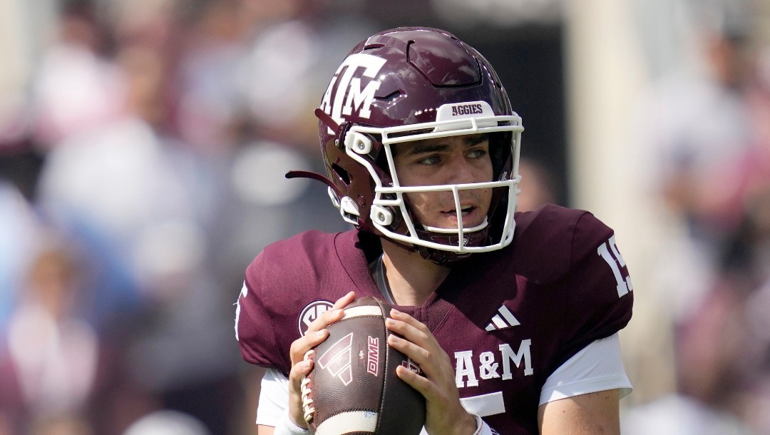 Texas A&M quarterback Conner Weigman (15) looks to pass downfield against Auburn during the first quarter of an NCAA college football game Saturday, Sept. 23, 2023, in College Station, Texas. (AP Photo/Sam Craft)
