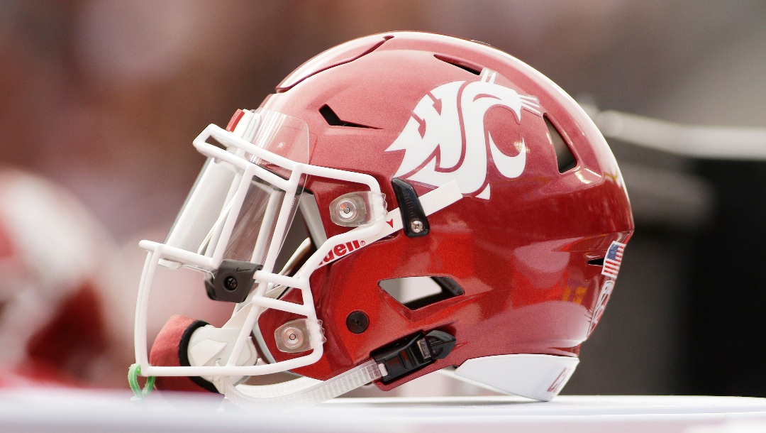 A Washington State helmet sits on the sideline during the first half of an NCAA college football game between Washington State and Northern Colorado in Pullman, Wash., Saturday, Sept. 7, 2019. (AP Photo/Young Kwak)
