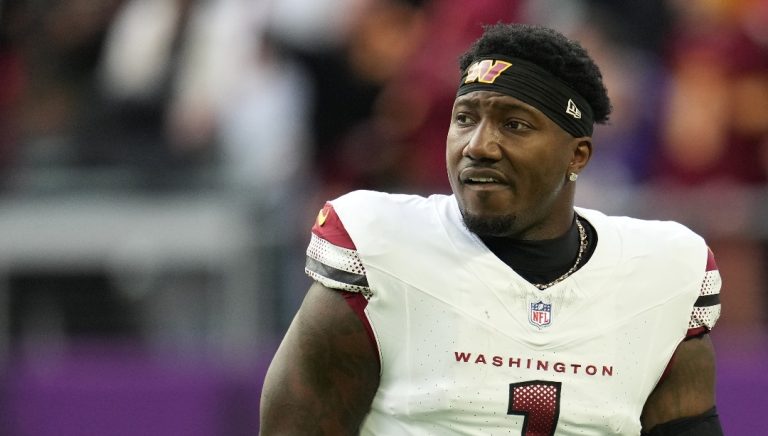 Washington Commanders wide receiver Deebo Samuel Sr. (1) stands on the field before an NFL football game against the Minnesota Vikings, Sunday, Dec. 7, 2025, in Minneapolis. (AP Photo/Abbie Parr)