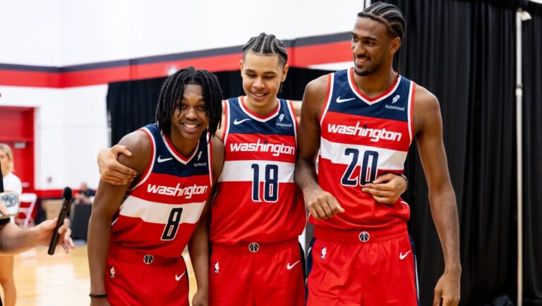 A behind the scenes look as Bub Carrington #8, Kyshawn George #18, and Alex Sarr #20 of the Washington Wizards are interviewed during the 2024 NBA Rookie Photo Shoot on JULY 17, 2024 at the University of Nevada, Las Vegas campus in Las Vegas, Nevada.