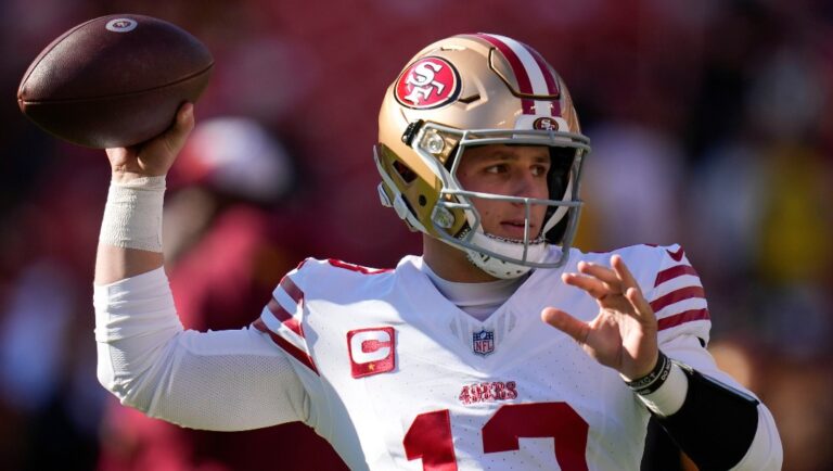 San Francisco 49ers quarterback Brock Purdy (13) throwing the ball during pregame warmups before the start of the first half of an NFL football game against the Washington Commanders, Sunday, Dec. 31, 2023, in Landover, Md. (AP Photo/Alex Brandon)