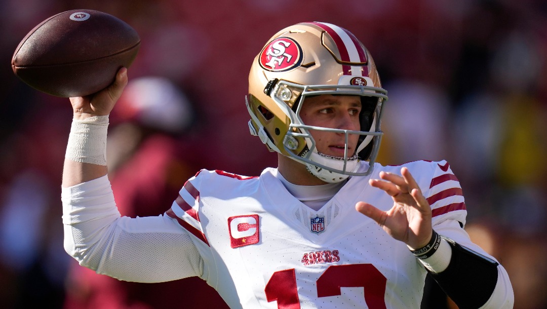 San Francisco 49ers quarterback Brock Purdy (13) throwing the ball during pregame warmups before the start of the first half of an NFL football game against the Washington Commanders, Sunday, Dec. 31, 2023, in Landover, Md. (AP Photo/Alex Brandon)
