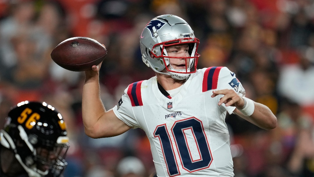 New England Patriots quarterback Drake Maye (10) passes against the Washington Commanders during the first half of a preseason NFL football game, Sunday, Aug. 25, 2024, in Landover, Md. (AP Photo/George Walker IV)