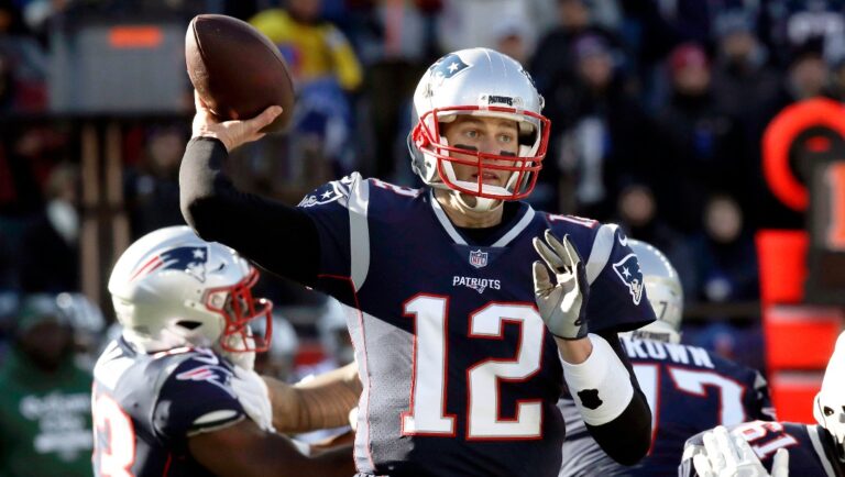 New England Patriots quarterback Tom Brady passes under pressure from the New York Jets during the first half of an NFL football game, Sunday, Dec. 30, 2018, in Foxborough, Mass.