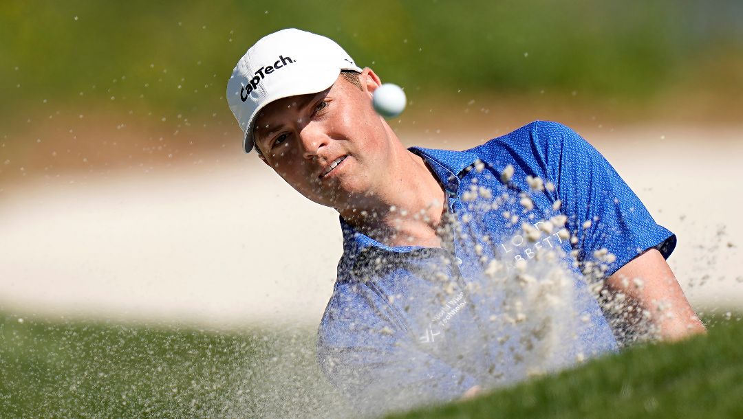 Ben Griffin hits from a bunker toward the second green during the final round of The Players Championship golf tournament, Sunday, March 12, 2023, in Ponte Vedra Beach, Fla.