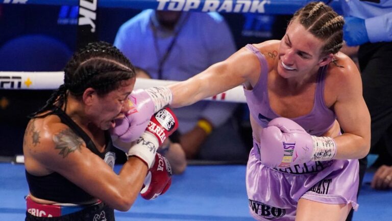 Mikaela Mayer hits Erica Farias, of Argentina, in a WBO female junior lightweight title fight Saturday, June 19, 2021.