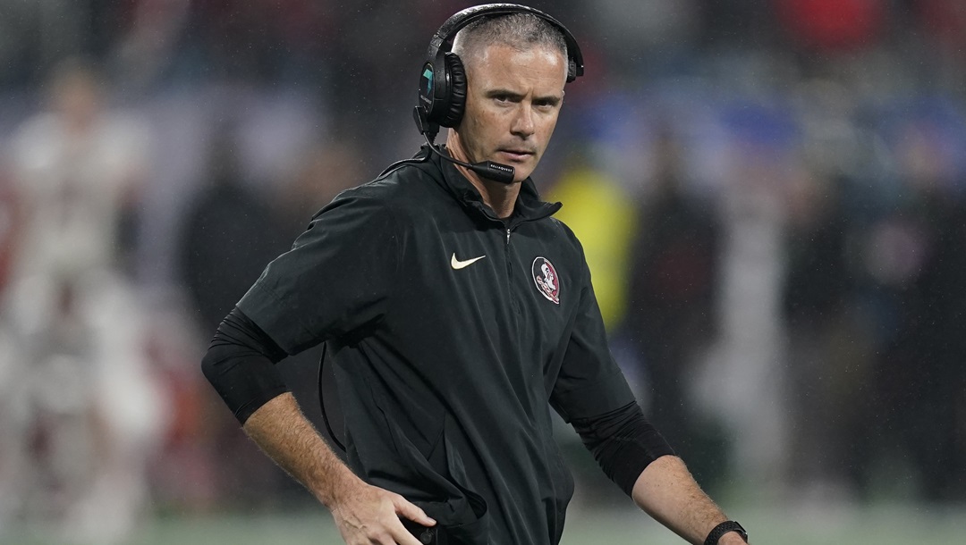 Florida State coach Mike Norvell walks on the field during a timeout in the second half of the team's Atlantic Coast Conference championship NCAA college football game against Louisville, Dec. 2, 2023, in Charlotte, N.C. Unbeaten Florida State was snubbed by the College Football Playoff last season. Norvell echoed the sentiment of other coaches, saying the ACC needs to fight its perception problem. “(We) have to continue to push the actual narrative or what needs to be the realistic narrative of how good this this league is,” he said.