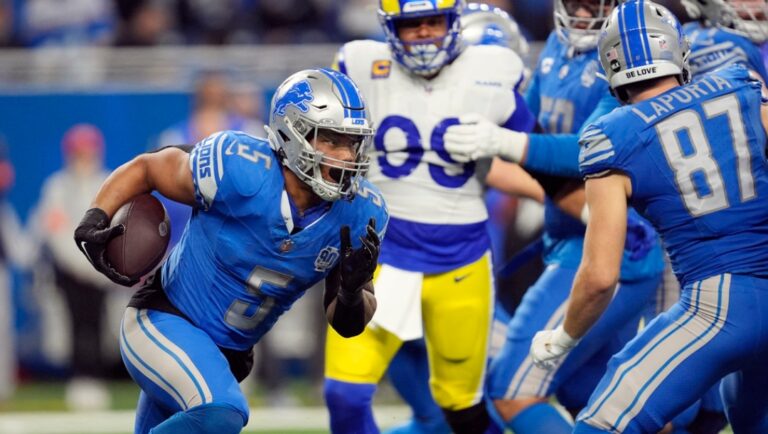 Detroit Lions running back David Montgomery (5) rushes during the second half of an NFL wild-card playoff football game against the Los Angeles Rams, Sunday, Jan. 14, 2024, in Detroit.