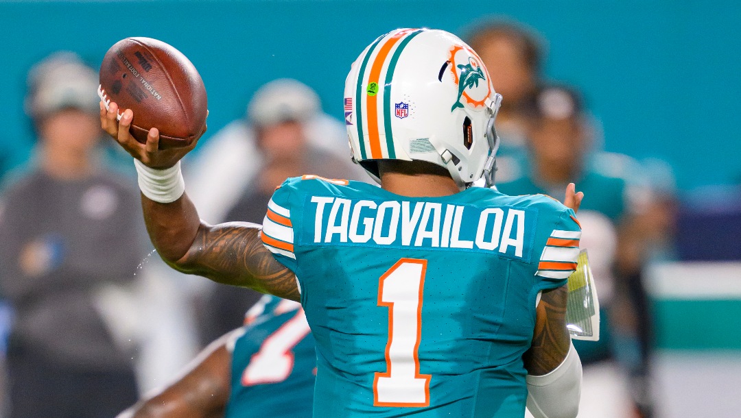 Miami Dolphins quarterback Tua Tagovailoa (1) throws the ball during an NFL football game against the Buffalo Bills, Thursday, Sept. 12, 2024, in Miami Gardens, Fla. (AP Photo/Doug Murray)