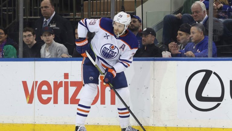 Edmonton Oilers' Leon Draisaitl skates with the puck during the first period of an NHL hockey game against the New York Rangers Sunday, March 16, 2025, in New York.