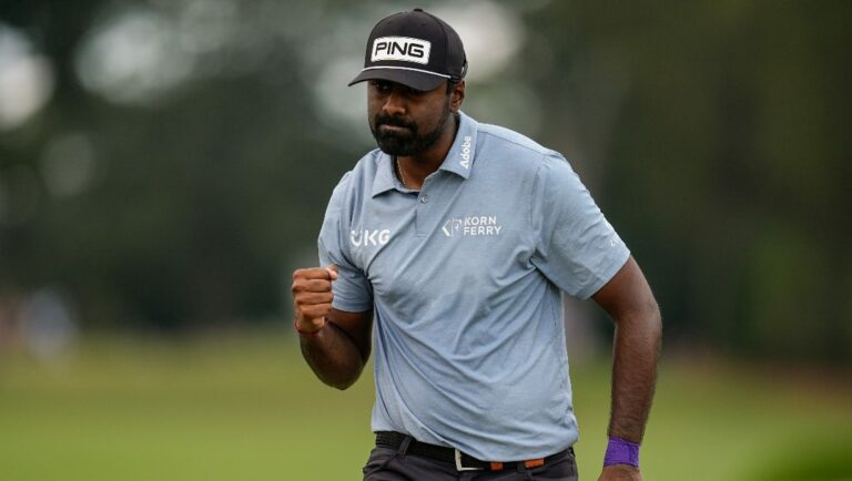 Sahith Theegala celebrates a birdie putt on the seventh green during the final round of the Tour Championship golf tournament, Sunday, Sept. 1, 2024, in Atlanta.
