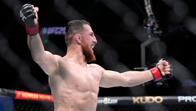 Merab Dvalishvili, left, celebrates in the closing seconds against Henry Cejudo during their bantamweight bout at the UFC 298.