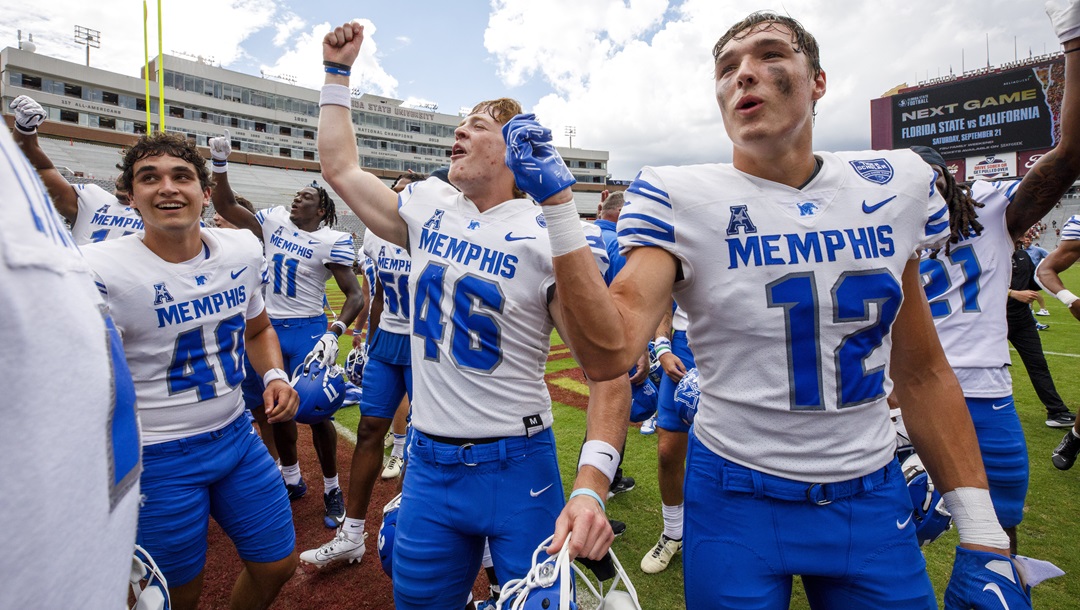Memphis long snapper Jonathan Zarut (40), punter Tanner Gillis (46) and wide receiver Brady Kluse (12) celebrate defeating Florida State 20-12 in a NCAA college football game, Saturday, Sept. 14, 2024, in Tallahassee, Fla.
