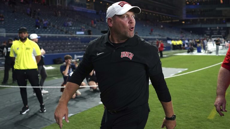 UNLV head coach Barry Odom walks off the field after win over Kansas in an NCAA college football game Friday, Sept. 13, 2024, at Children's Mercy Park in Kansas City, Kan.