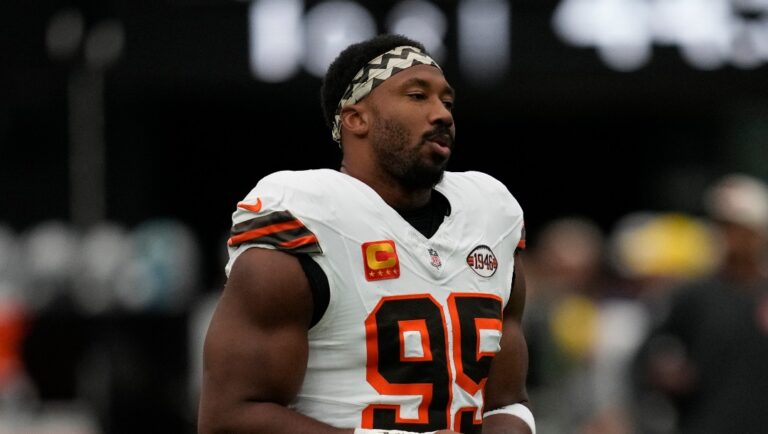 Cleveland Browns defensive end Myles Garrett (95) warms up before an NFL football game against the Las Vegas Raiders, Sunday, Sept. 29, 2024, in Las Vegas. (AP Photo/John Locher)