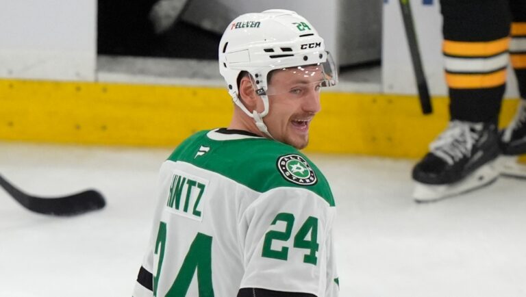 Dallas Stars center Roope Hintz (24) smiles as he returns to the bench after scoring in the third period of an NHL hockey game against the Boston Bruins, Thursday, Oct. 24, 2024, in Boston. (AP Photo/Steven Senne)