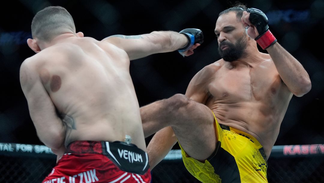 Michel Pereira, right, strikes Michal Oleksiejczuk during a UFC 299 mixed martial arts bout, Saturday, March 9, 2024, in Miami.