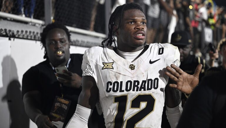 Colorado wide receiver Travis Hunter (12) leaves the field after an NCAA college football game against Central Florida, Saturday, Sept. 28, 2024, in Orlando, Fla.