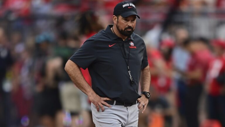 Ohio State head coach Ryan Day walks before an NCAA college football game against Notre Dame, Saturday, Sept. 3, 2022, in Columbus, Ohio. Ohio State and Michigan are making the Big Ten look like the Big Two and Little 12, rekindling memories of Woody Hayes and Bo Schembechler turning the chase for a conference championship into a two-team race.