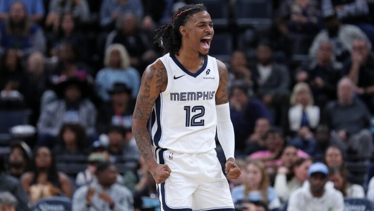Ja Morant #12 of the Memphis Grizzlies reacts during the game against the Miami Heat at FedExForum on October 18, 2024 in Memphis, Tennessee.